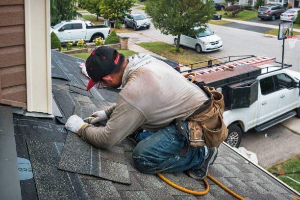 Professional Roofing technician working in Norton, VT